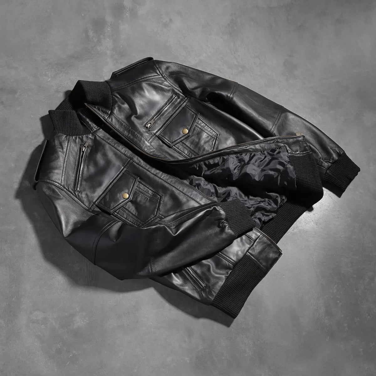 Rib knit &amp; Hem Craftsmanship Construction Detail on Men's Agent Shadow Black Leather Bomber Jacket