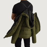 
Close-Up Detail of Classic Collar & Zipper With Wind Flap Hardware on Erico Green Hooded Puffer Jacket