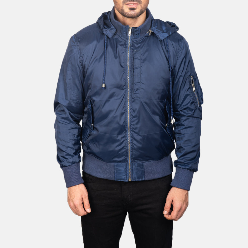 Close-Up Detail of Knit Rib with Removable Nylon Hood &amp; Zipper Hardware on Men's Blue Hooded Bomber Jacket