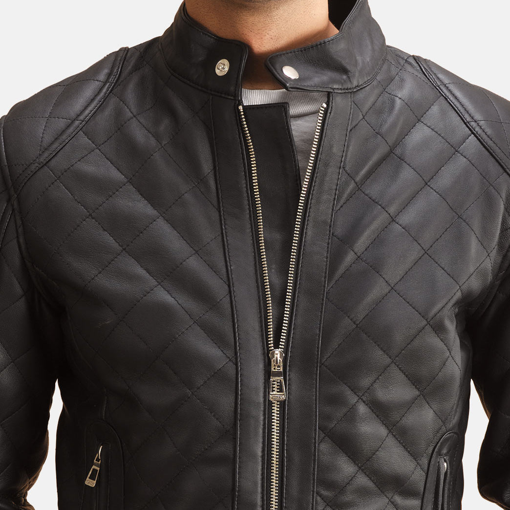 
Close-Up Detail of Band with Snap Button & Zipper Hardware on Henry Quilted Black Leather Jacket