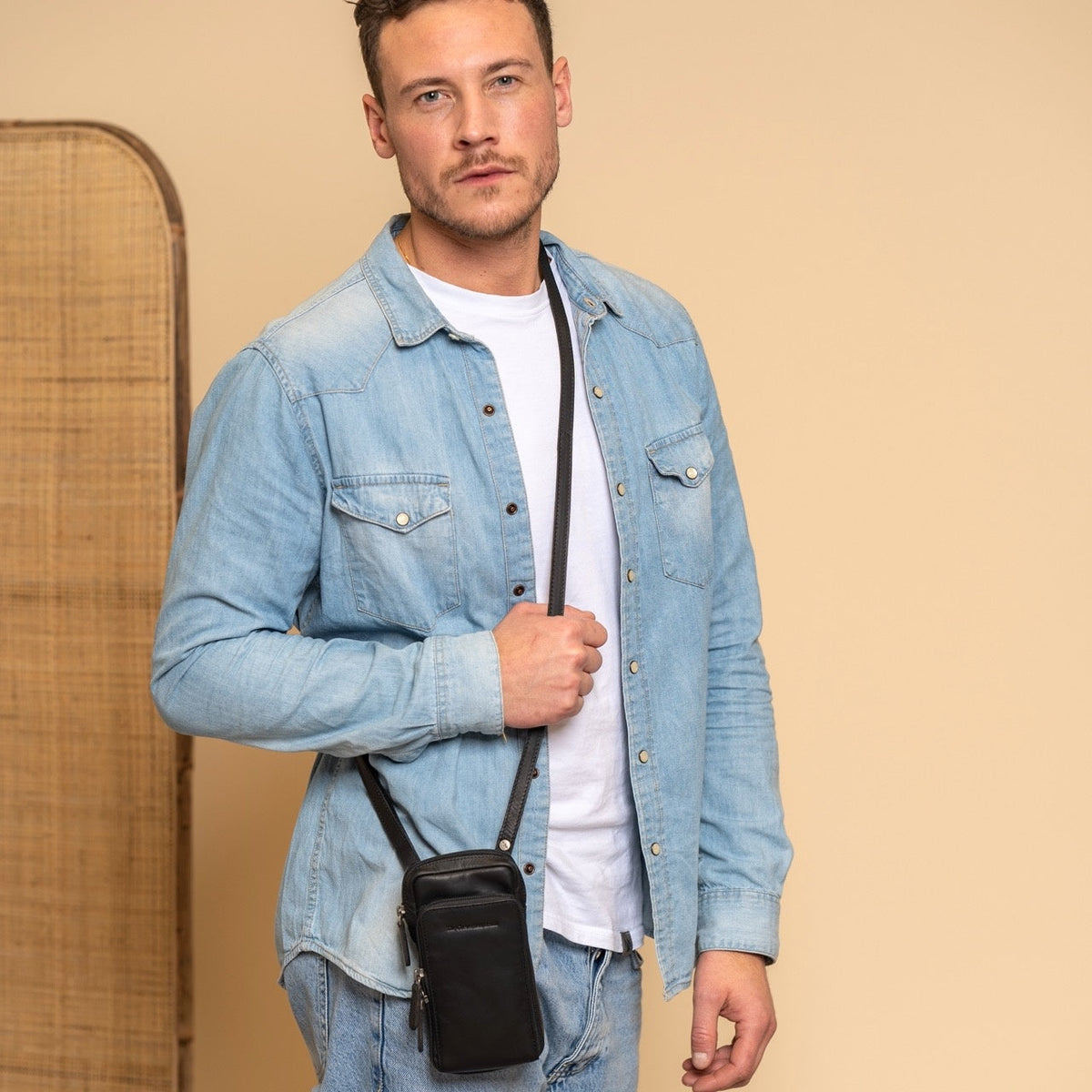 Valdes Full-Grain Leather Phone Bag - Lateral Side Profile View Showing Sleeve Cut & Athletic Taper Fit