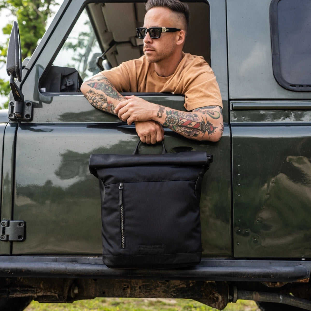 Bornholm Full-Grain Leather Roll-top Backpack - Structured Side Profile Showing Gusset Depth &amp; Expansion Capacity