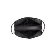 
Tailored Rib Cuffs & Hem Craftsmanship Construction Detail on Stefan Full-Grain Leather Toiletry Bag