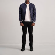 Close-Up Detail of Varsity &amp; Button Hardware on Xander Blue Varsity Jacket